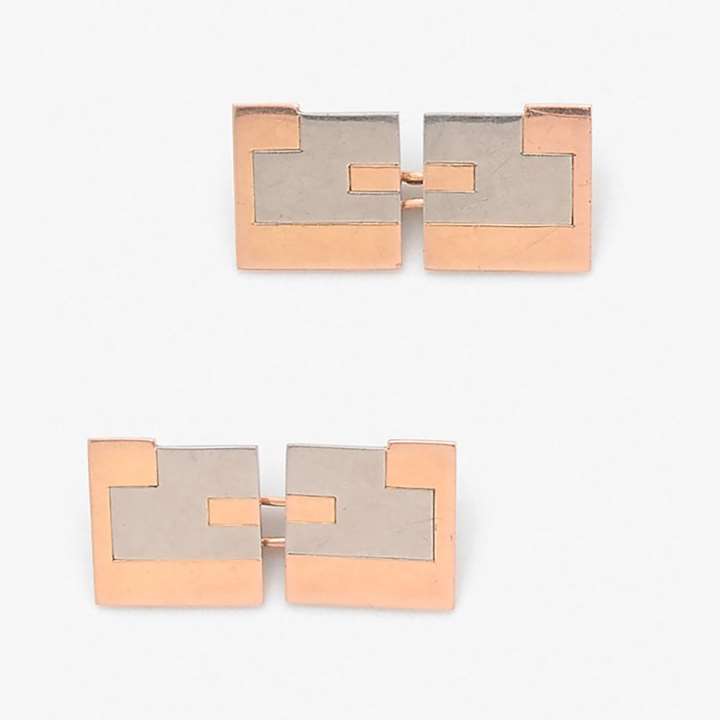 Pair of two colour cufflinks of geometric design